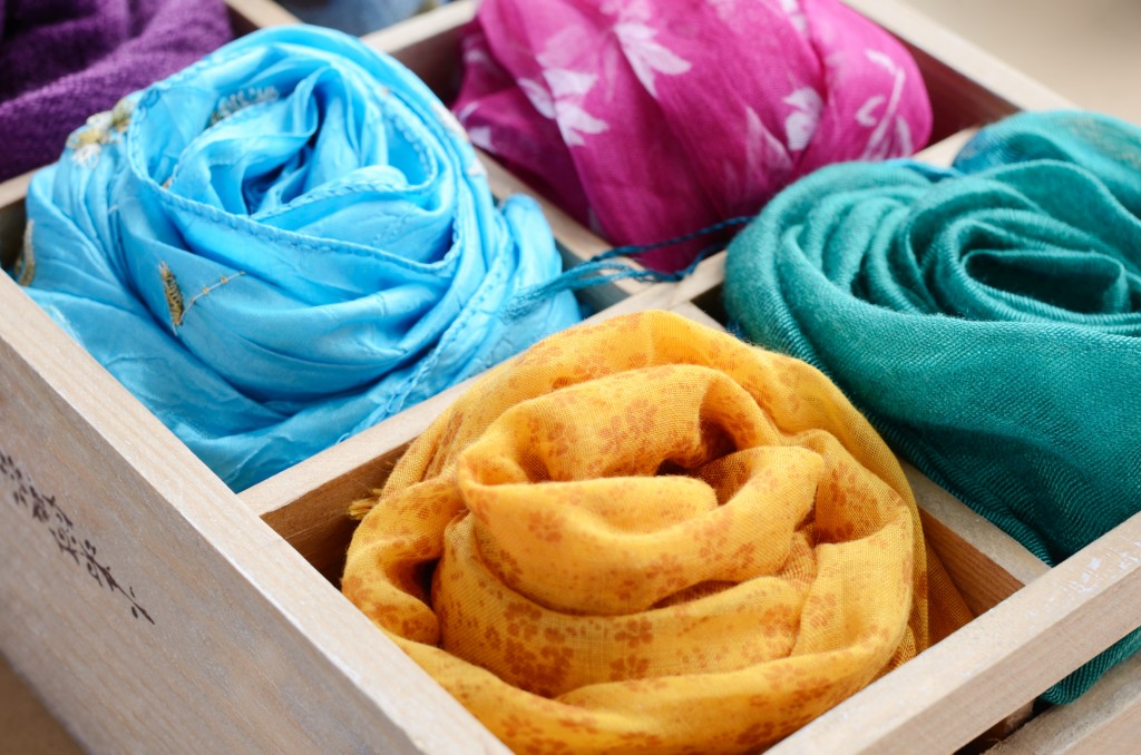 Set of colorful scarves in vintage wooden box